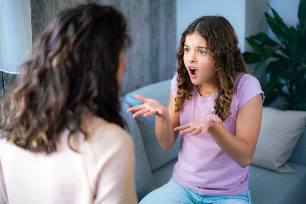 Parent and teenager in conflict